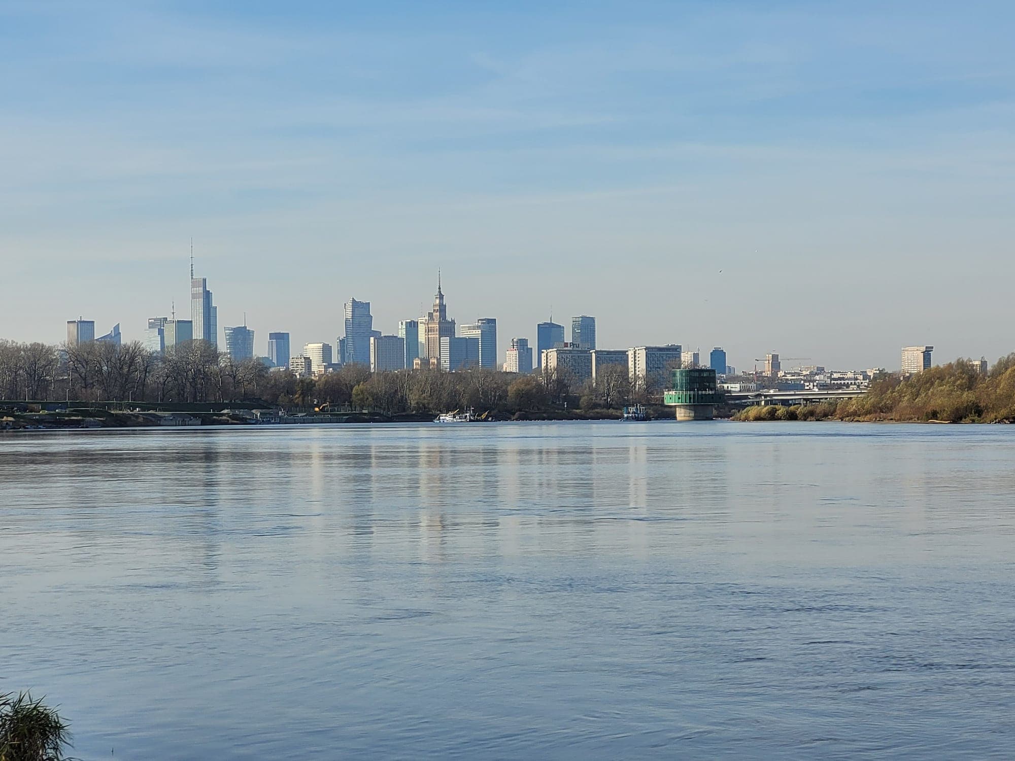 Warsaw's business district rising above the Vistula river