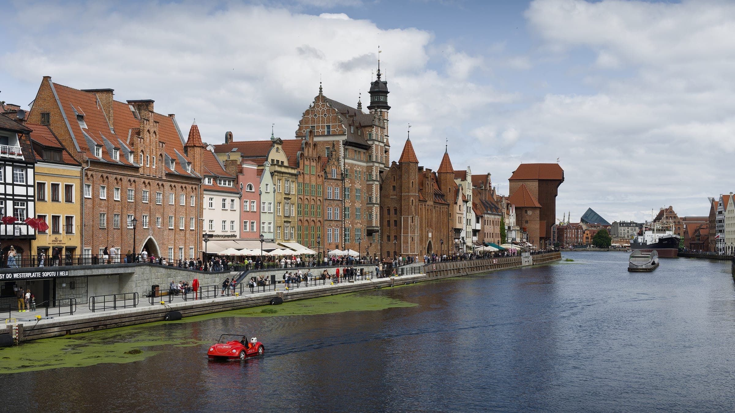 Historic waterfront houses along the Motława river in Gdańsk